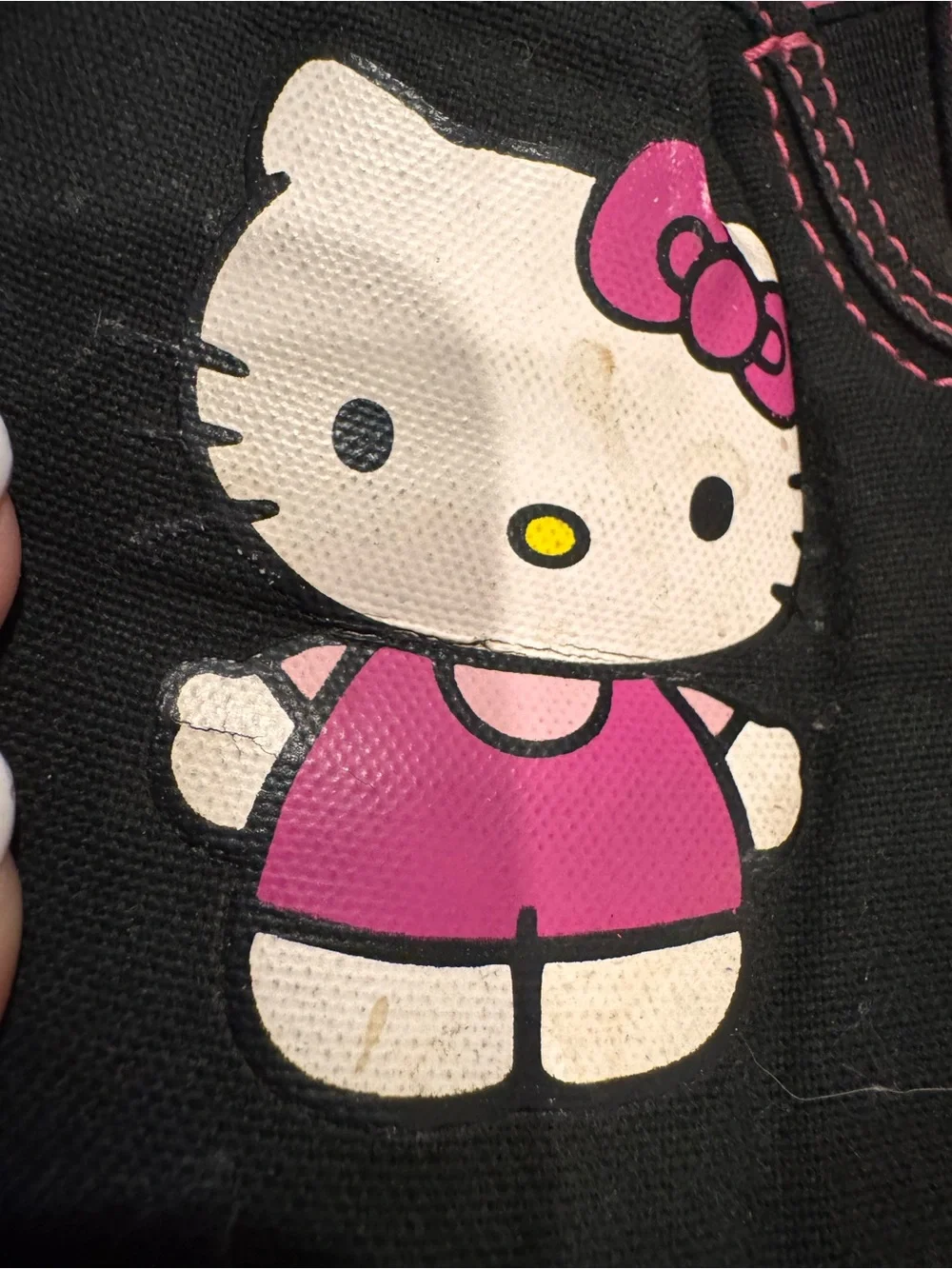 Vans Sanrio Black and Pink Hello Kitty Slip-On Shoes